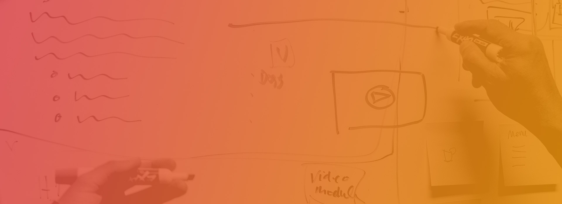 A person planning on a whiteboard